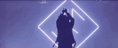 Man Singing Into Microphone On Stage GIF