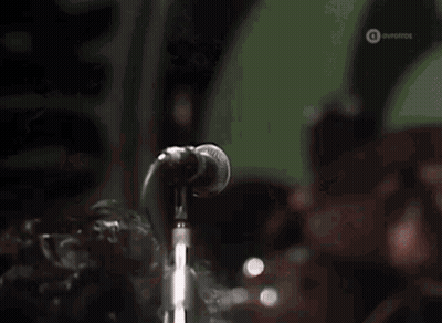 Man Singing Into Microphone Ovofros GIF
