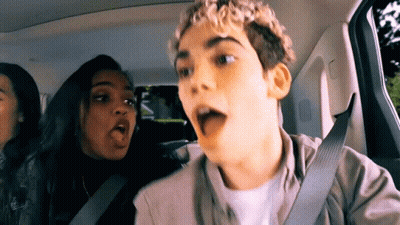 Man Singing Into Microphone Playing Keyboard GIF