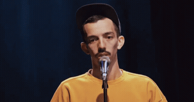 Man Singing Into Microphone GIF