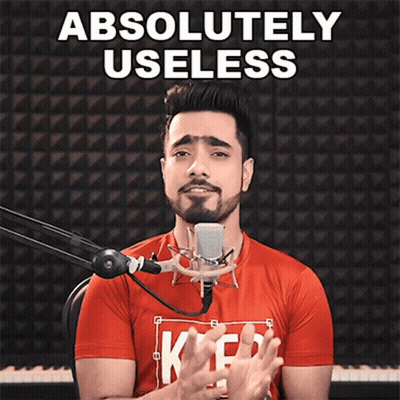 Man Singing Into Microphone Saying Absolutely Useless GIF