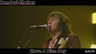 Man Singing Into Microphone Saying Have a Nice Day