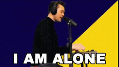 Man Singing Into Microphone Saying I Am Alone GIF