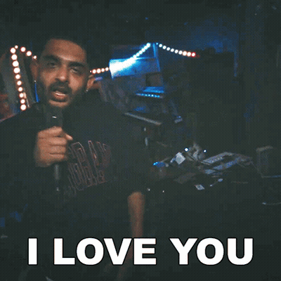 Man Singing Into Microphone Saying I Love You