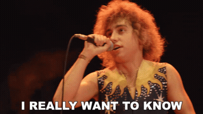 Man Singing Into Microphone Saying I Really Want To Know GIF