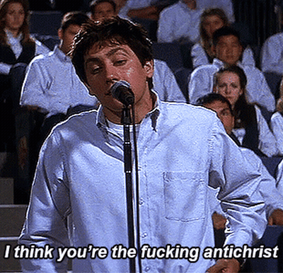 Man Singing Into Microphone Saying I Think You're the Fucking Antichrist