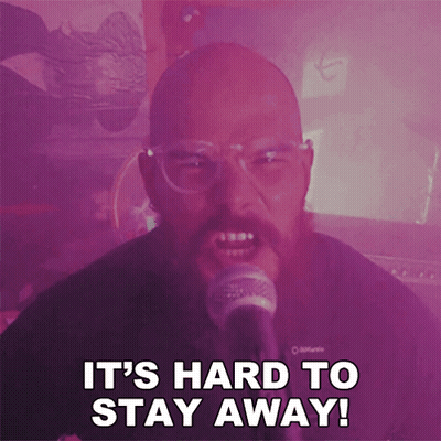 Man Singing Into Microphone Saying It's Hard To Stay Away GIF