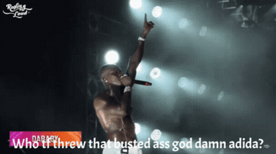 Man Singing Into Microphone Saying Who Threw That Busted Ass God Damn Adidas GIF