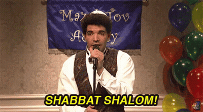 Man Singing Into Microphone Says Shabbat Shalom GIF