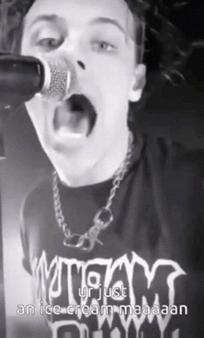 Man Singing Into Microphone GIF