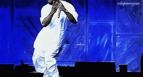 Man Singing Into Microphone GIF