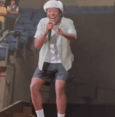 Man Singing Into Microphone GIF
