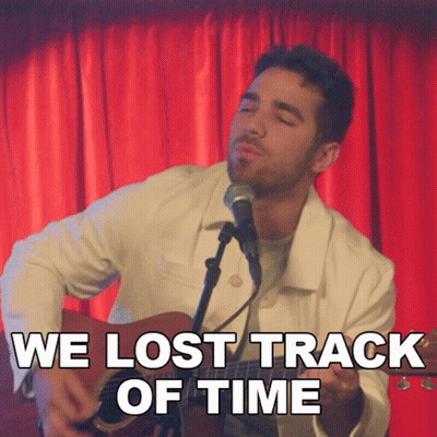 Man Singing Into Microphone We Lost Track Of Time GIF