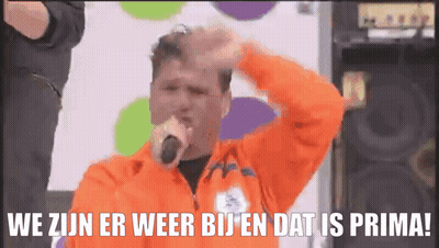 Man Singing Into Microphone We Zijn Er Weer Bij En Dat Is Prima GIF