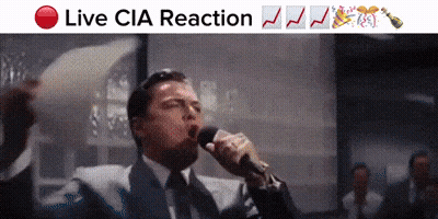 Man Singing Into Microphone With Live CIA Reaction Sign GIF