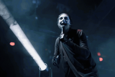 Man Singing Into Microphone With Red Light GIF