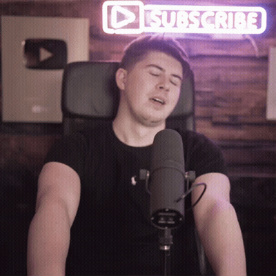 Man Singing Into Microphone With Subscribe Sign GIF
