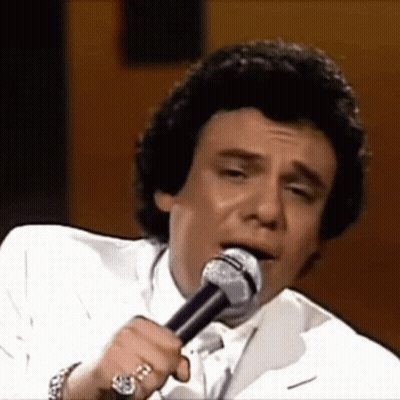 Man Singing Into Microphone With Watch GIF