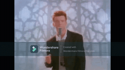Man Singing Into Microphone With Wondershare Filmora Logo GIF