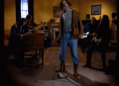 Man Singing Into Microphone GIF
