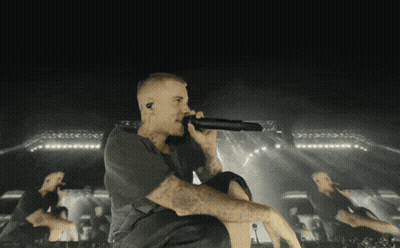 Man Singing Into Microphone GIF