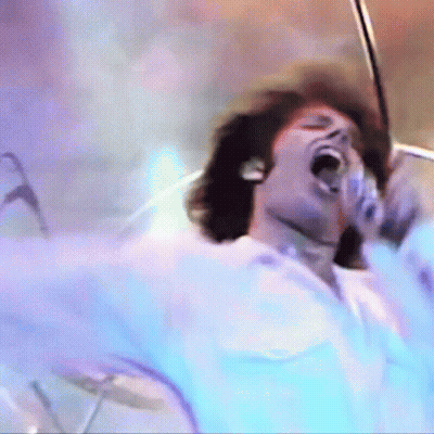 Man Singing Into Microphone GIF