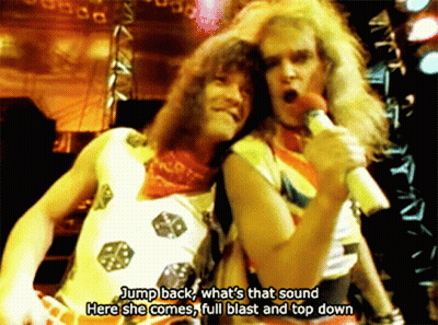 Man Singing Jump Back Full Blast GIF