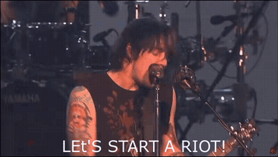 Man Singing Let's Start A Riot GIF