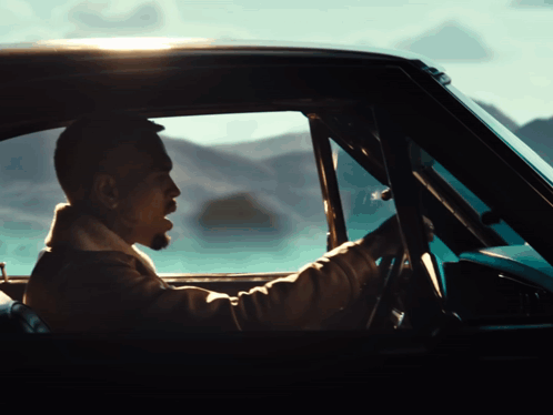 Man Singing While Driving GIF