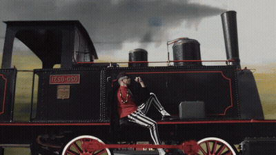 Man Sits On Front Of Train Saying Eso-Oso GIF