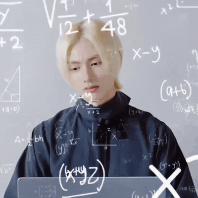 Man Sitting At Chalkboard With Math Equations GIF