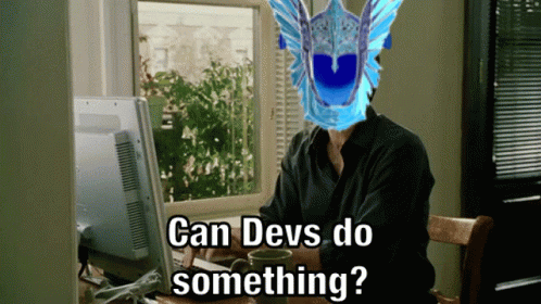 Man Sitting At Computer With Blue Mask Saying Can Devs Do Something GIF