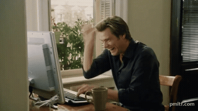 Man Sitting At Computer With Pmitf.com GIF