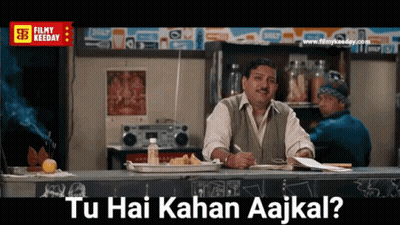 Man Sitting At Counter Tu Hai Kahan Aajkal GIF