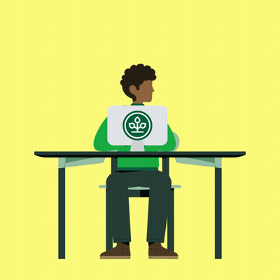 Man Sitting At Desk Holding Laptop With Green Logo GIF