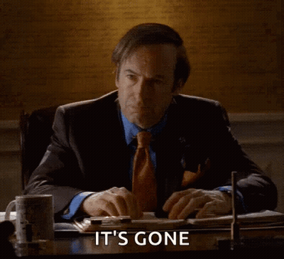 Man Sitting At Desk Poof It's Gone GIF