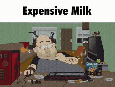 Man Sitting At Desk Saying Expensive Milk GIF