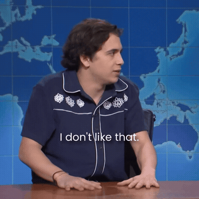 Man Sitting At Desk Saying I Don't Like That GIF