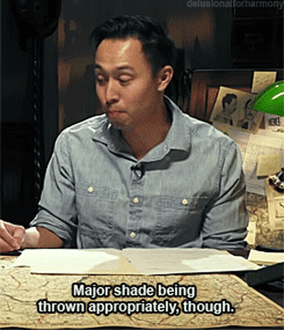 Man Sitting At Desk Saying Major Shade GIF