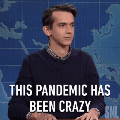 Man Sitting At Desk Saying This Pandemic Has Been Crazy GIF