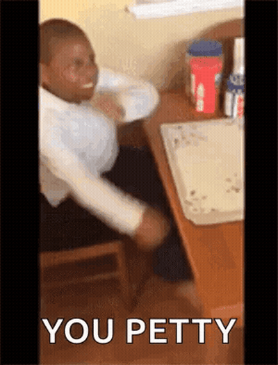 Man Sitting At Desk Saying You Petty GIF