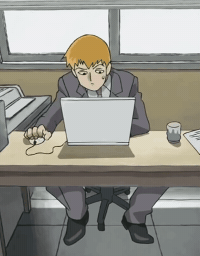Man Sitting At Desk Using Laptop GIF