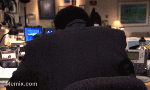 Man Sitting At Desk With Memix.com GIF