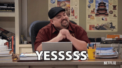 Man Sitting At Desk With Netflix Sign GIF