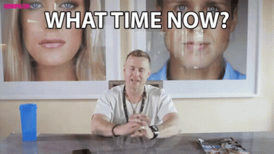 Man Sitting At Desk With What Time Now GIF