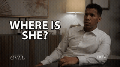 Man Sitting At Desk With Where Is She GIF