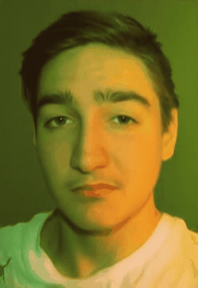 Man Sitting At Desk Writing On Paper GIF