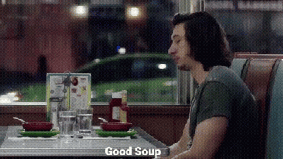 Man Sitting At Diner Table With Bowl Of Soup GIF