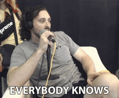 Man Sitting At Microphone Saying Everybody Knows GIF