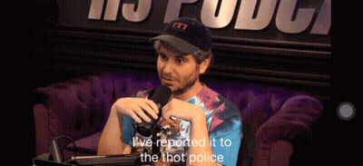 Man Sitting At Microphone Saying I've Reported It To The Thot Police GIF